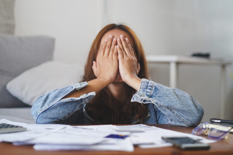 Young,Asian,Woman,Cover,Her,Face,After,Stressed,With,Monthly