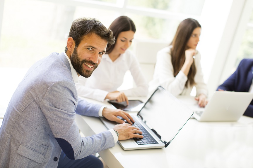 Businessman,Working,On,Laptop,In,The,Office