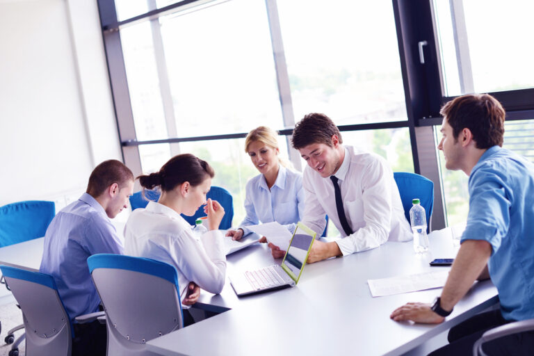 Group,Of,Happy,Young,Business,People,In,A,Meeting,At