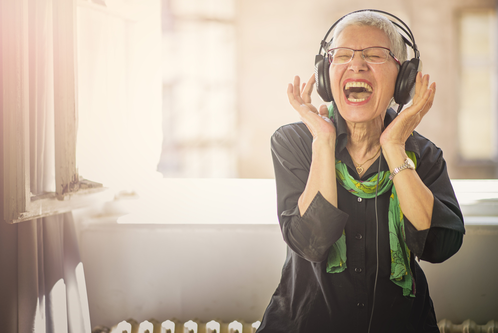 Senior,Old,Woman,Listening,To,Her,Favourite,Music,Through,Big