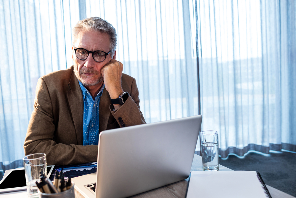 Businessman,At,Office,Looking,Sad