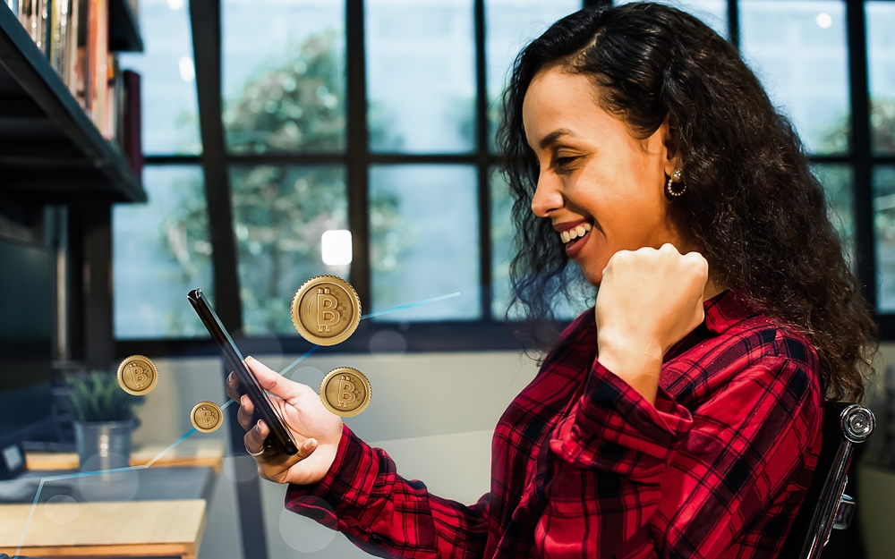 Beautiful,Cheerful,Caucasian,Woman,Wearing,Shirt,,Holding,Mobile,Phone,,Rasing