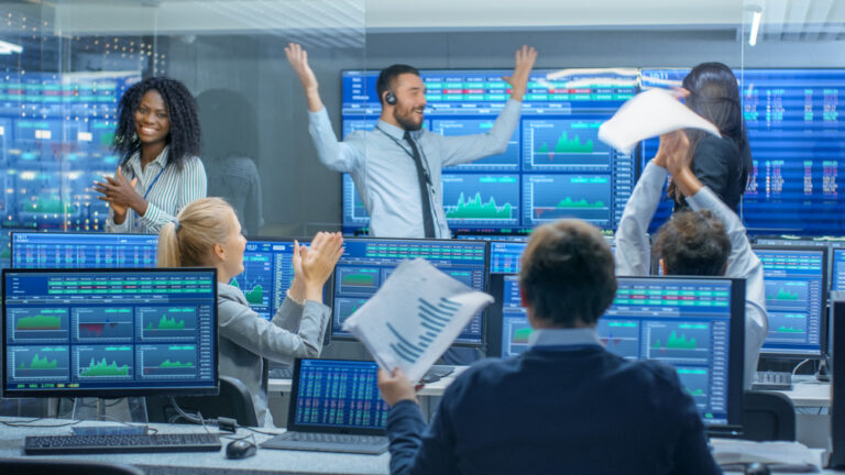 Multi-ethnic,Team,Of,Traders,Have,Successful,Day,At,The,Stock