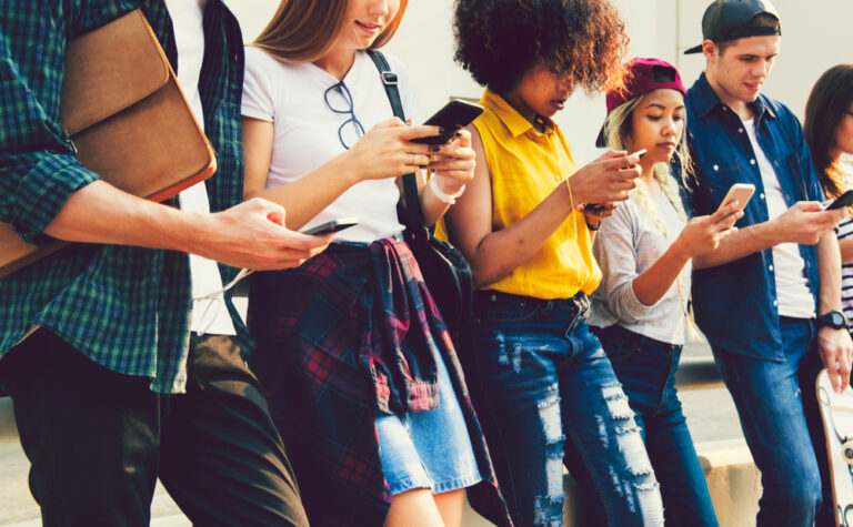 Diverse,Friends,Using,Their,Phones