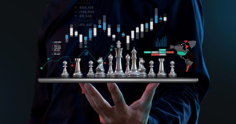 Businessman,Hold,Chess,On,Tablet,,Online,Investment,Strategy,Stock,Market