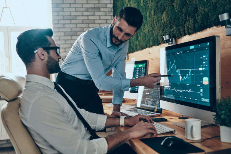 Two,Young,Modern,Men,In,Formalwear,Working,Using,Computers,While