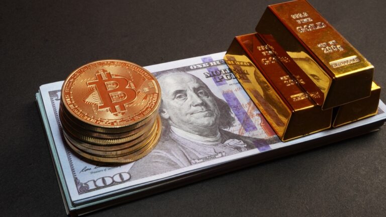 Gold,Bullion,And,Bitcoin,Coins,On,Stack,Of,Us,Dollar