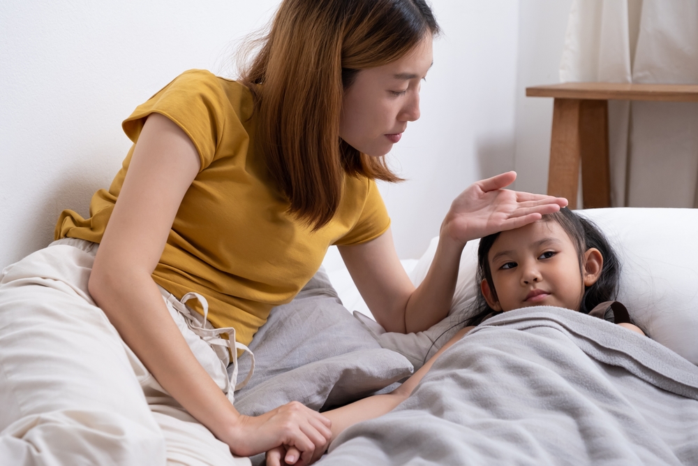 Close,Up,Shot,Of,Young,Asian,Girl,Who,Has,Fever.