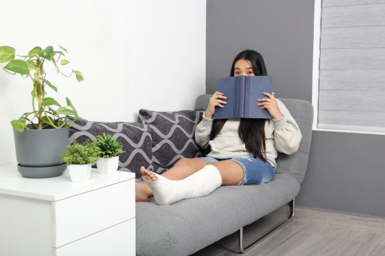 30-year-old,Brunette,Latina,Woman,Reads,A,Book,In,Her,Living